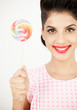 Cute young pinup showing her lollipop