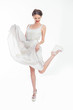 Pretty teen raising her dress and her leg