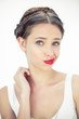 Attractive teen with red lips posing