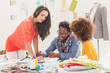 Group of fashion designers working together