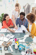 Group of young fashion designers working together