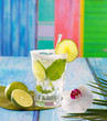 Cuban Mojito cocktail in tropical blue wood flowers and starfish