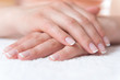 Beautiful hand with perfect nail french manicure