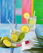 Cuban Mojito cocktail in tropical blue wood flowers and starfish
