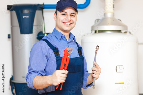 Photo: Portrait of a plumber at work Portrait of a plumber at work