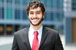 Handsome young businessman in an urban setting