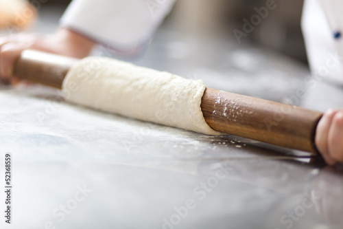 Photo: Chef preparing dough Chef preparing dough