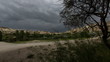 cave house with dramatic clouds at cappadocia Turkey