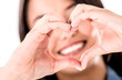 Woman making a heart shape