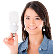 Woman with an energy saving bulb