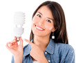 Woman with an energy saving lightbulb