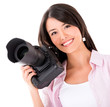 Foto: Photographer holding a digital camera Photographer holding a digital camera