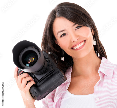 Photo: Woman holding a camera Woman holding a camera