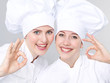 Two female apprentices for cooking show thumb up