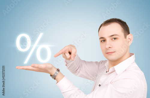 Photo: man with percent sign man with percent sign