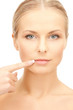 Foto: woman touching her lips woman touching her lips