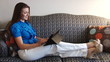 Video: Pretty happy businesswoman working on tablet computer Pretty happy businesswoman working on tablet computer