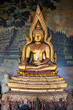 Photo: Gilded figure of Buddha in the temple. Indonesia Gilded figure of Buddha in the temple. Indonesia