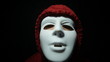 Horror masked man over dark background