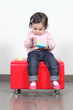 Baby playing with construction toys