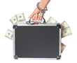 money, case of dollars in hand with handcuffs, isolated