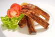 Photo: Closeup of barbecued pork ribs and vegetables Closeup of barbecued pork ribs and vegetables