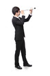 Businessman with telescope looking forward