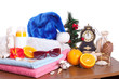Christmas and beach accessories over white