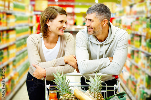 Photo: Couple in supermarket Couple in supermarket