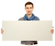 Photo: A handsoma man holding a blank, isolated on white background A handsoma man holding a blank, isolated on white background