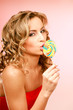 Photo: young happy woman with lollipop young happy woman with lollipop