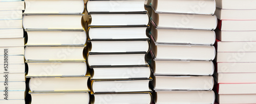 Photo: Stacks of new books Stacks of new books