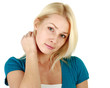 Photo: Young woman standing with folded arms Young woman standing with folded arms
