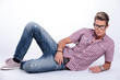casual man serious on the floor