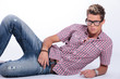 casual man sits on floor