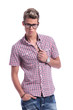 casual man unbuttoning shirt