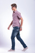 casual man walking forward
