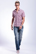 casual man walks forward