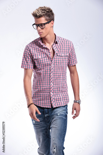 Photo: casual man walking to you casual man walking to you