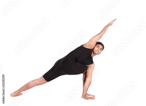 Photo: Yoga by Indian man on white Yoga by Indian man on white