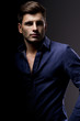 Elegant young handsome man. Studio fashion portrait.