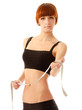 Photo: Young woman holding a tape measure Young woman holding a tape measure
