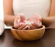 Photo: Woman's hands in bowl of water Woman's hands in bowl of water