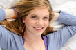 Portrait of relaxing young girl listening music