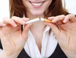 Photo: woman breaking a cigarette woman breaking a cigarette