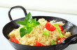 Couscous with salad greens and tomato