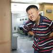 Photo: Asian boy with an abdominal pain Asian boy with an abdominal pain