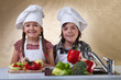 Foto: Happy kids washing vegetables for a salad Happy kids washing vegetables for a salad