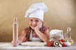 Foto: Little girl making pizza Little girl making pizza