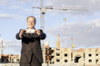 Businessman at the construction site.